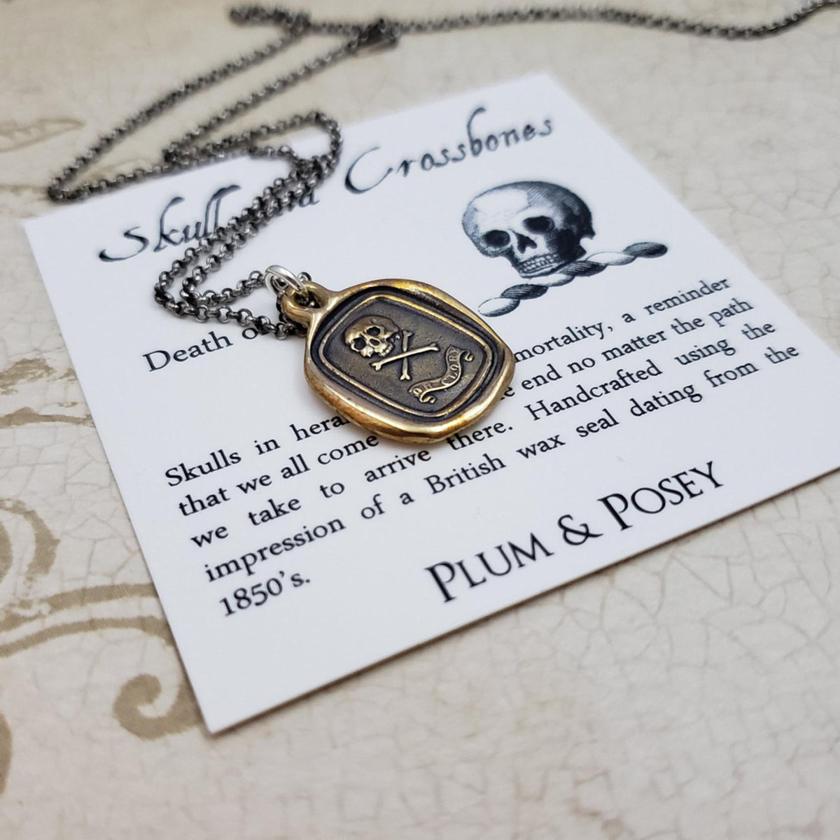 Skull & Crossbones 'I do not fear your heart' necklace in Gold Vermeil -  Plum and Posey